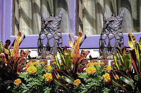 stereo pair of metal owl sculpture